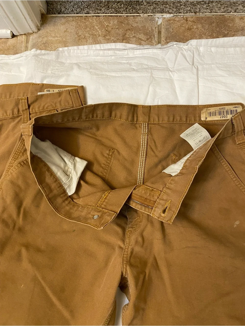 2 vintage Carhartt pants, fair condition Size 36 by 30 Some Stains and Flaws